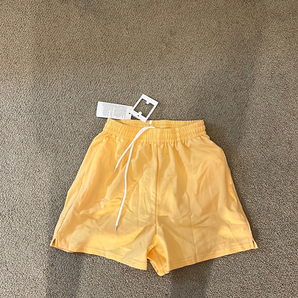 Never worn before (tags on) yellow lounge shorts